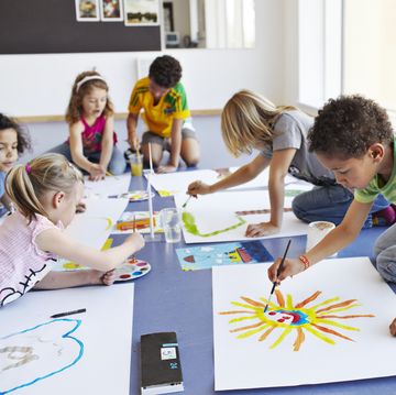 back to school activities, kids on the floor painting