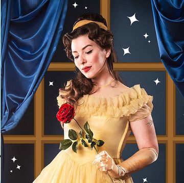 Brunette Halloween Costumes a woman dressed in belle's yellow dress from beauty and the beast and rosie the riveter
