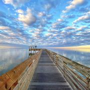 clouds over the south padre island boardwalk