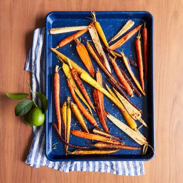 Coriander-Maple Glazed Carrots in blue pan coriandermaple glazed carrots in blue pan