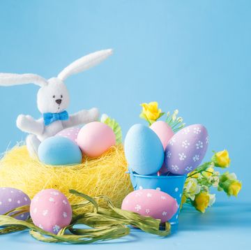 easter puns - Easter egg decorations over blue background pastel colored easter egg decorations over blue background