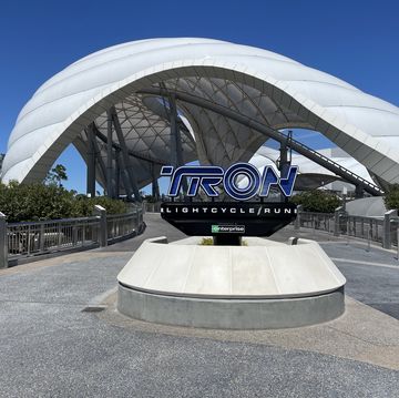tron light cycle run at walt disney world ride sign and outdoor view