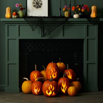 pumpkin carving ideas pumpkin carving ideas, pumpkins with carved flam designs in front of the green fireplace