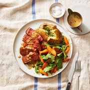 steak au poivre with a side salad and baked potato