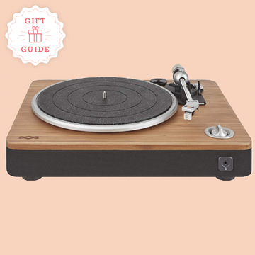 a record player and golf chipper are two good housekeeping picks for best gifts for men