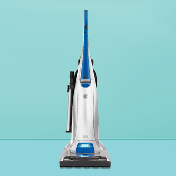 good housekeeping best vacuum for pet hair on blue background