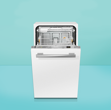 white dishwasher open on blue background